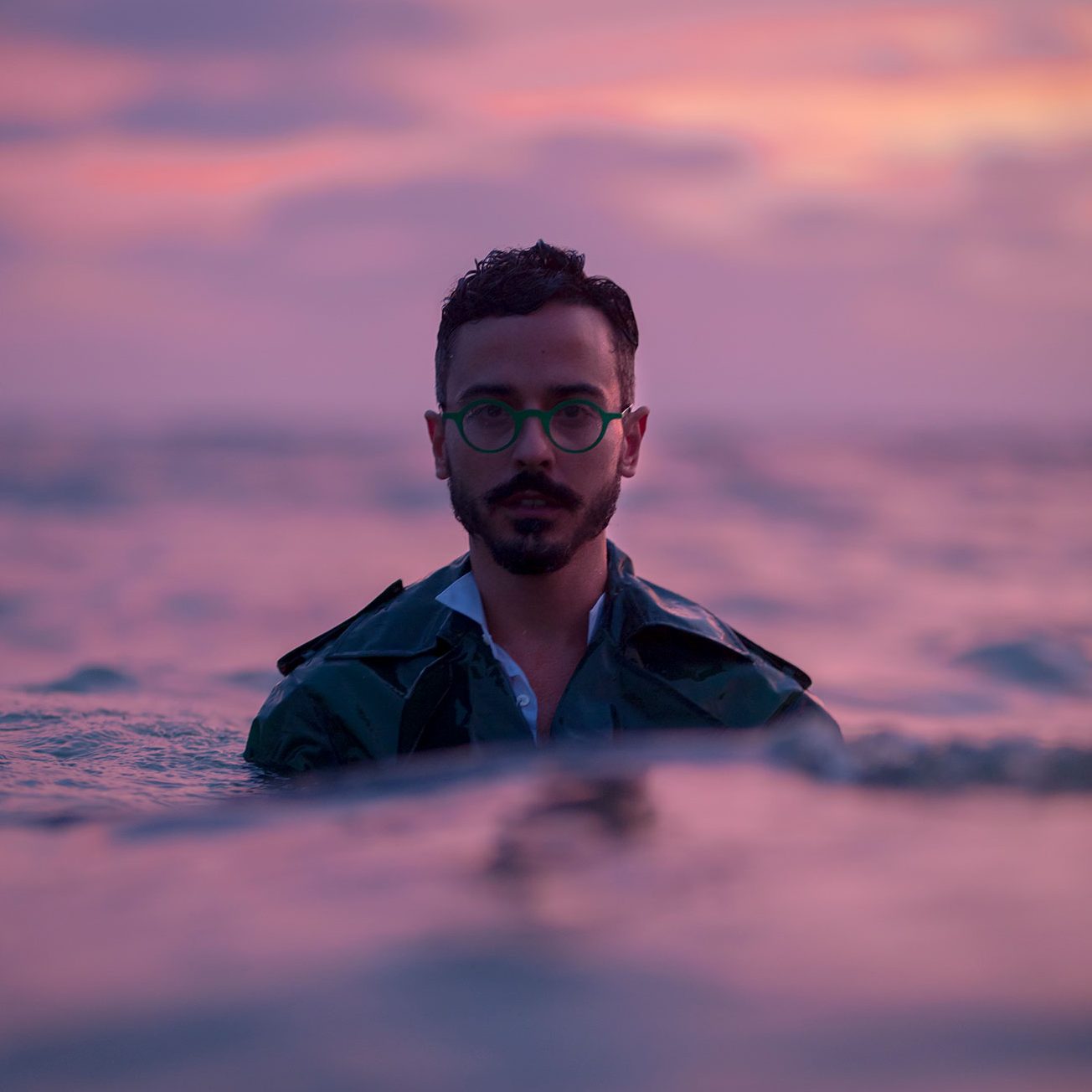 Portrait of Raúl Rosillo Raúl Rosillo portrayed at sea at sunset, in a conceptual image that explores identity, introspection and relationship with the landscape